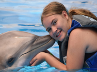 Raine dolphin kiss